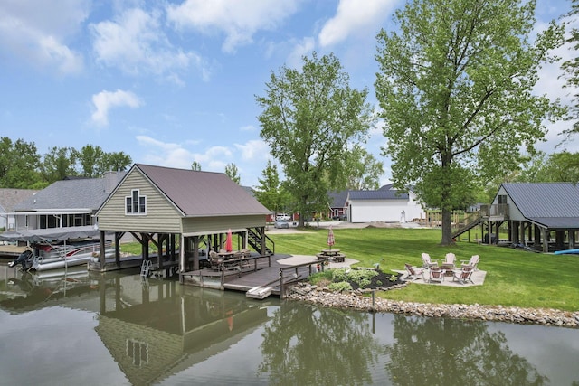 0 Canoe Ln, Thornville, OH 43076 - dock with an outdoor fire pit, a water view, a yard, and boat lift
