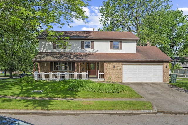 6329 Birkewood St, Columbus, OH 43229 - traditional-style home with brick siding, asphalt driveway, a porch, a front yard, and a garage