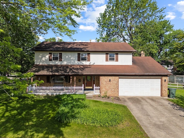 6329 Birkewood St, Columbus, OH 43229 - traditional home with concrete driveway, brick siding, a porch, and an attached garage