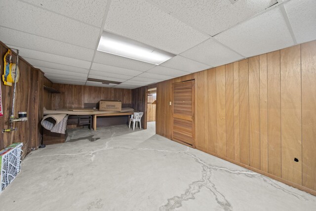 6329 Birkewood St, Columbus, OH 43229 - finished basement with wood walls and a drop ceiling