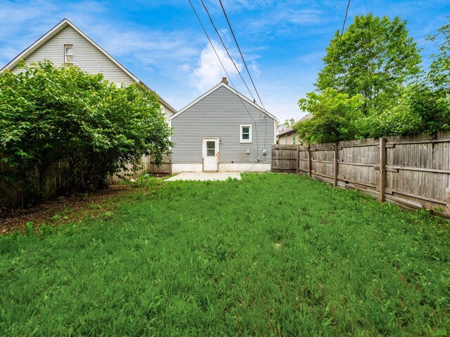 84 Meek Ave, Columbus, OH 43222 - rear view of property with a patio area