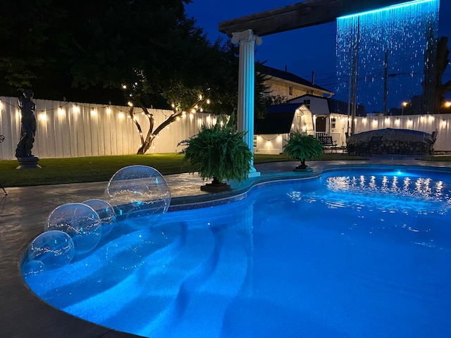 178 W 2nd St, Chillicothe, OH 45601 - pool at night featuring a patio