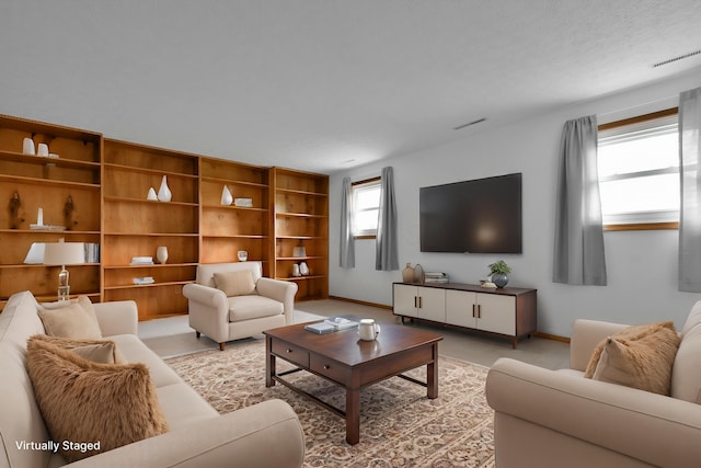 6301 Columbus Rd, Centerburg, OH 43011 - living area featuring baseboards