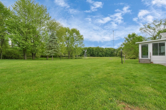 6301 Columbus Rd, Centerburg, OH 43011 - view of green lawn featuring entry steps