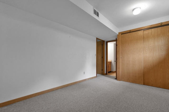 6301 Columbus Rd, Centerburg, OH 43011 - unfurnished bedroom featuring carpet, baseboards, and a closet