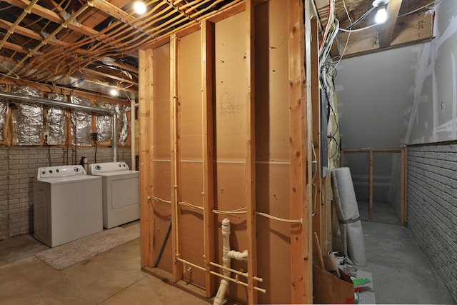524 Autumn Ridge Cir, Pickerington, OH 43147 - unfinished below grade area with washing machine and clothes dryer and brick wall