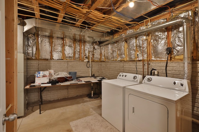 524 Autumn Ridge Cir, Pickerington, OH 43147 - washroom with washing machine and dryer and brick wall