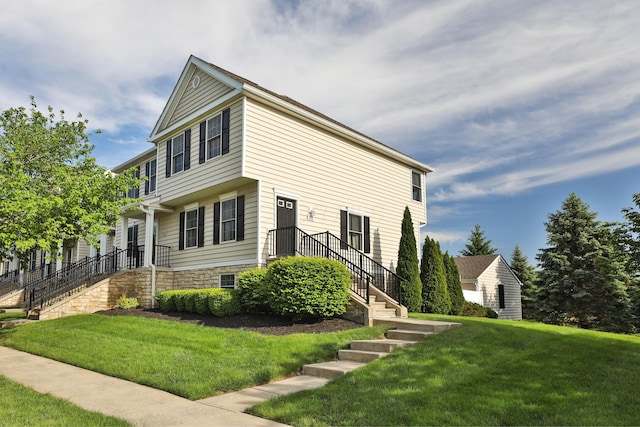 524 Autumn Ridge Cir, Pickerington, OH 43147 - view of side of property with a lawn and stone siding