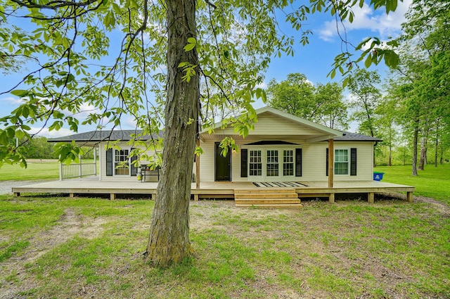 6125 Stafford Rd, Washington Court House, OH 43160 - back of house featuring a lawn and a wooden deck