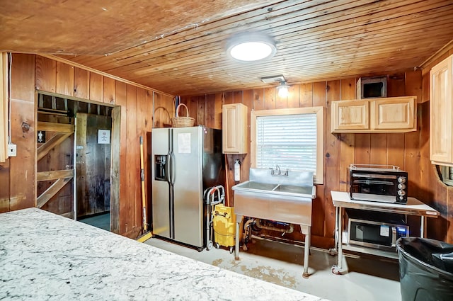 6125 Stafford Rd, Washington Court House, OH 43160 - kitchen with stainless steel appliances, wooden walls, wood ceiling, a sink, and light countertops