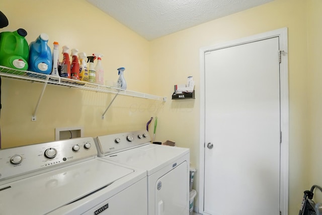 6963 Weurful Dr, Canal Winchester, OH 43110 - washroom with separate washer and dryer and a textured ceiling