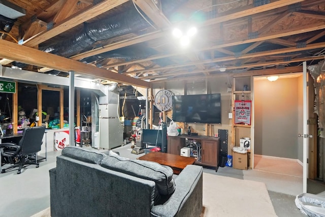 6963 Weurful Dr, Canal Winchester, OH 43110 - living room with heating unit and concrete flooring