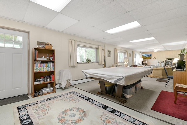 2116 Dunzweiler Dr, Zanesville, OH 43701 - rec room with pool table, a drop ceiling, a baseboard heating unit, and a baseboard radiator