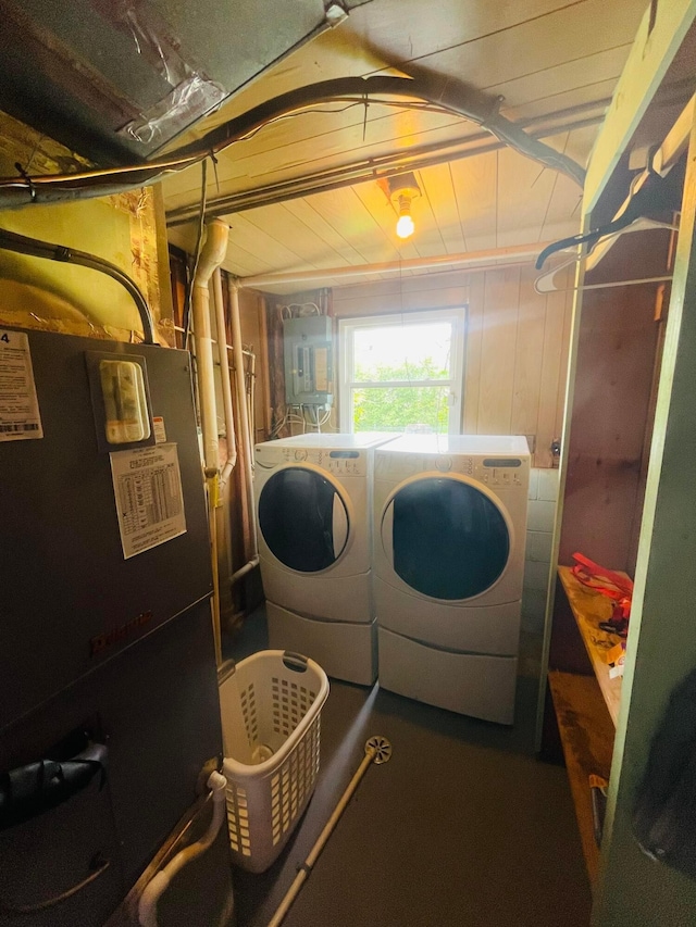 1275 Hathersage Pl, Galloway, OH 43119 - washroom featuring washer and dryer, electric panel, and heating unit