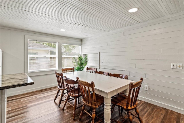 11526 Horseshoe Channel Dr, Lakeview, OH 43331 - dining area featuring wood finished floors, baseboards, wooden walls, and recessed lighting