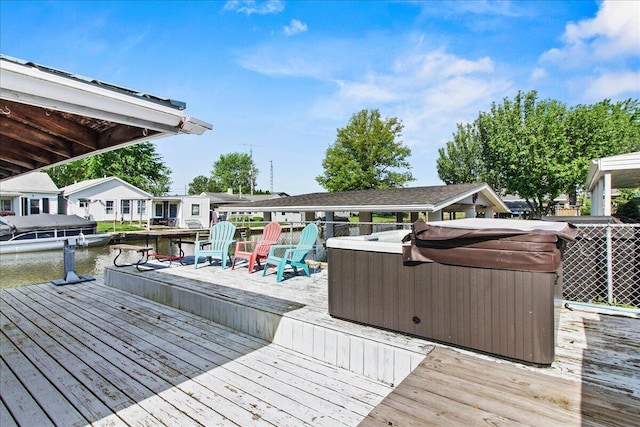 11526 Horseshoe Channel Dr, Lakeview, OH 43331 - wooden deck with a hot tub and a water view