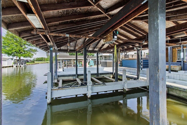 11526 Horseshoe Channel Dr, Lakeview, OH 43331 - dock with boat lift and a water view