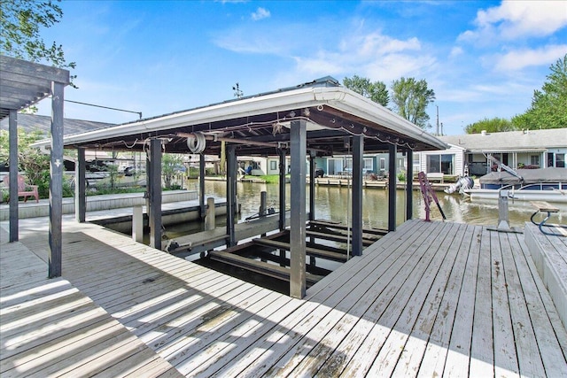 11526 Horseshoe Channel Dr, Lakeview, OH 43331 - dock area featuring boat lift and a water view