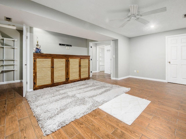 7020 Avery Rd, Dublin, OH 43017 - below grade area featuring a ceiling fan, baseboards, wood finished floors, and recessed lighting