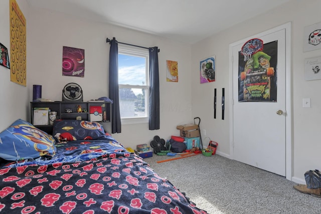 610 W Wheeling St, Lancaster, OH 43130 - bedroom with carpet floors and baseboards