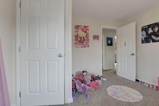610 W Wheeling St, Lancaster, OH 43130 - recreation room with carpet flooring and baseboards