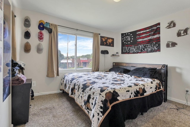 610 W Wheeling St, Lancaster, OH 43130 - bedroom with carpet floors and baseboards