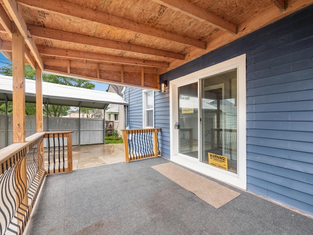 view of patio / terrace featuring fence