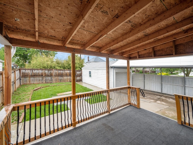 view of patio / terrace with an outbuilding