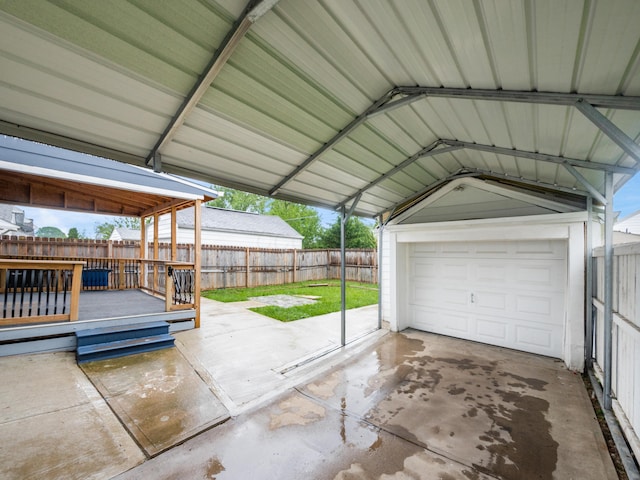 garage with fence