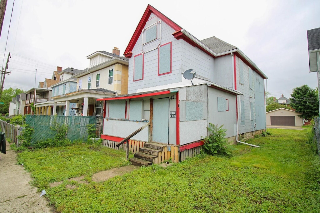 42 Rodgers Ave, Columbus, OH 43222 - back of house with entry steps and a detached garage