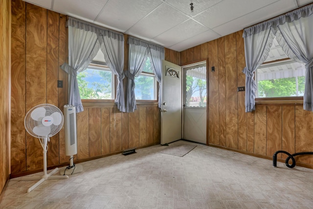 222 Union St, Lancaster, OH 43130 - foyer entrance with wooden walls, tile patterned floors, plenty of natural light, and baseboards