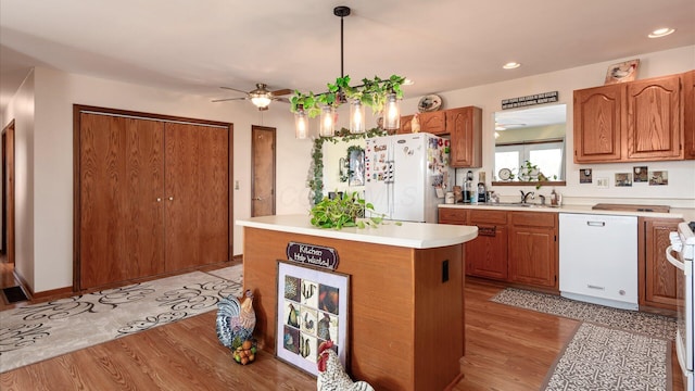 3890 Township Road 70 NW, Somerset, OH 43783 - kitchen with white appliances, ceiling fan, light countertops, light wood-type flooring, and recessed lighting