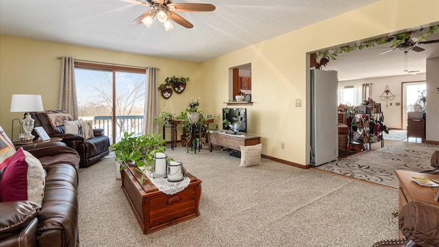 3890 Township Road 70 NW, Somerset, OH 43783 - carpeted living room with a ceiling fan, healthy amount of natural light, and baseboards