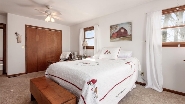 3890 Township Road 70 NW, Somerset, OH 43783 - carpeted bedroom with a closet, baseboards, and a ceiling fan