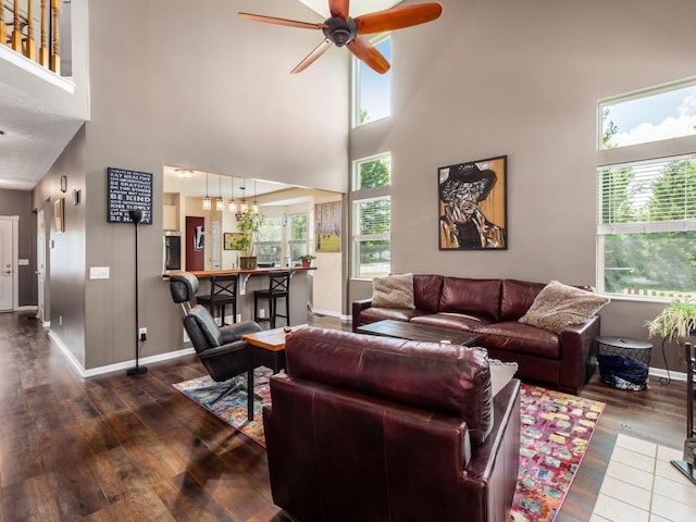 299 Stonhope Dr, Delaware, OH 43015 - living room featuring a towering ceiling, wood finished floors, and a ceiling fan