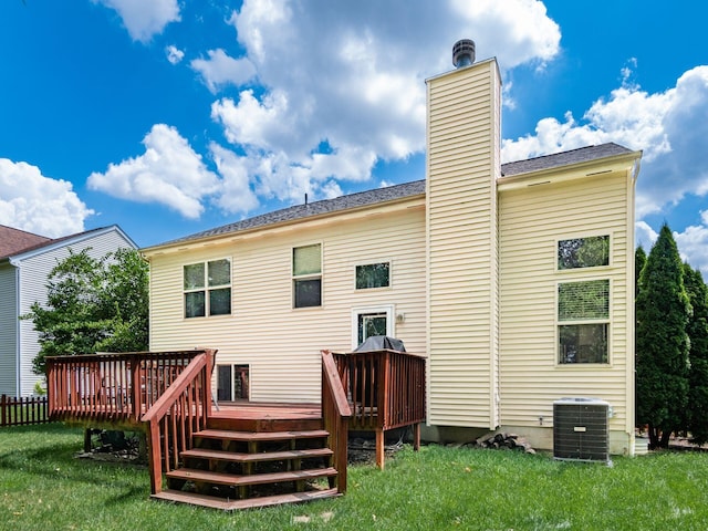 299 Stonhope Dr, Delaware, OH 43015 - back of property featuring a deck, a chimney, and a yard