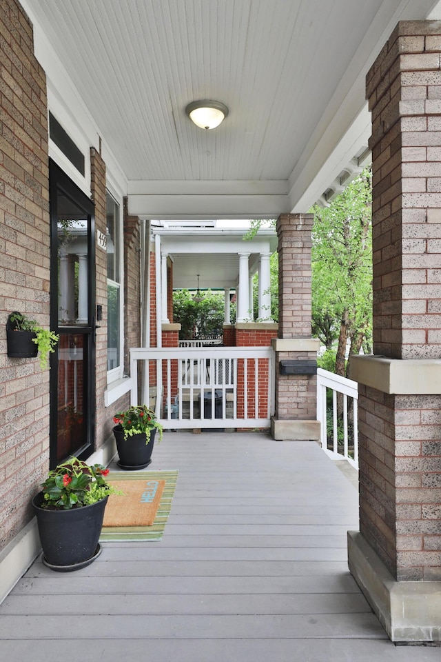 459 E Whittier St, Columbus, OH 43206 - wooden deck featuring covered porch