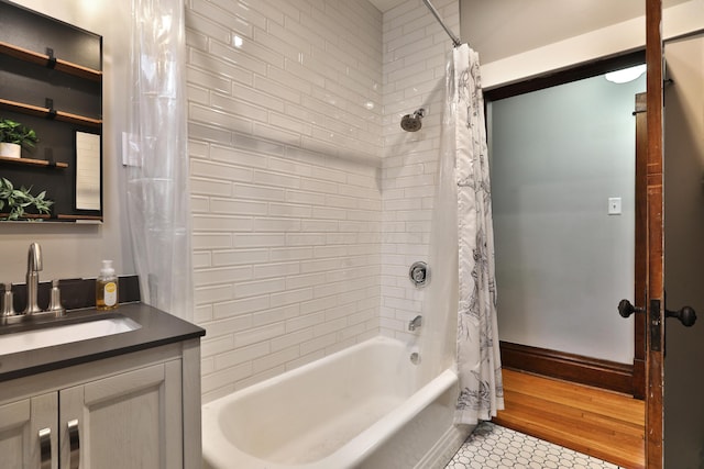 459 E Whittier St, Columbus, OH 43206 - bathroom with shower / bath combination with curtain, vanity, tile patterned floors, and baseboards