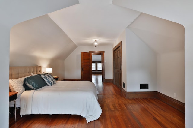 459 E Whittier St, Columbus, OH 43206 - bedroom with wood-type flooring, baseboards, and lofted ceiling