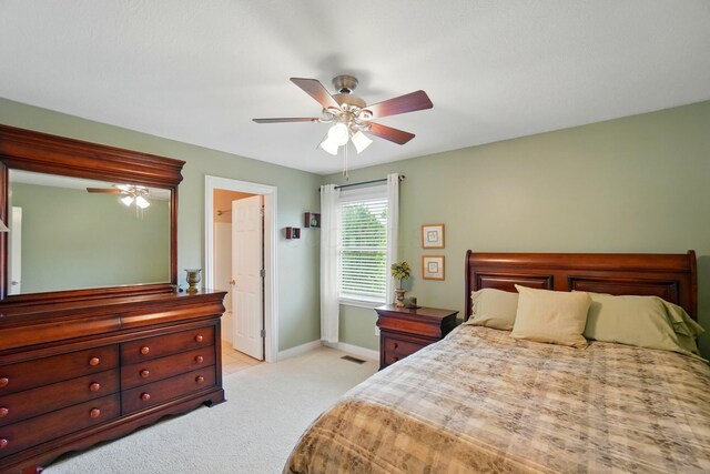 6467 Spring Run Dr, Westerville, OH 43082 - bedroom with light carpet, baseboards, and a ceiling fan