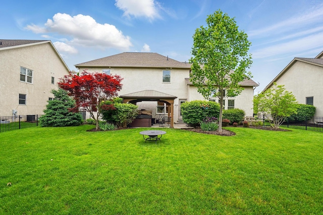 6467 Spring Run Dr, Westerville, OH 43082 - rear view of property featuring a gazebo, stucco siding, and a hot tub