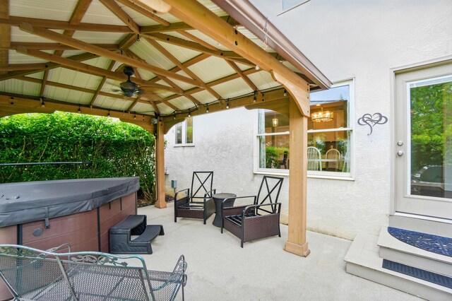 6467 Spring Run Dr, Westerville, OH 43082 - view of patio / terrace featuring a gazebo, a hot tub, and ceiling fan