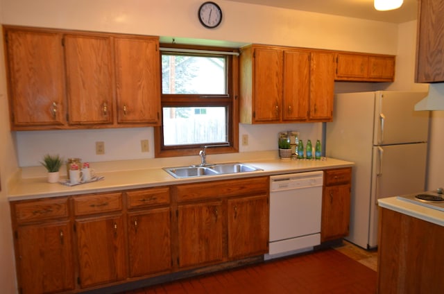 494 Park Overlook Dr, Worthington, OH 43085 - kitchen featuring white appliances, a sink, brown cabinets, and light countertops