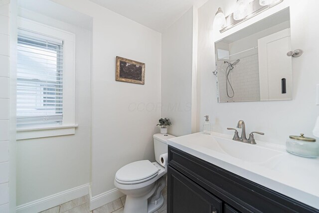 1272 Broadview Ave, Columbus, OH 43212 - full bath featuring vanity, toilet, tiled shower, and baseboards