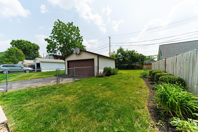 1272 Broadview Ave, Columbus, OH 43212 - view of yard with a detached garage and an outbuilding