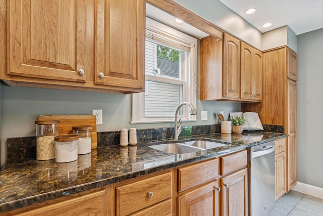 1057 Harrison Ave, Columbus, OH 43201 - kitchen with dishwasher, light tile patterned flooring, dark stone countertops, and recessed lighting