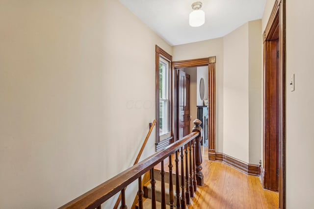 1057 Harrison Ave, Columbus, OH 43201 - corridor featuring an upstairs landing and light wood-type flooring