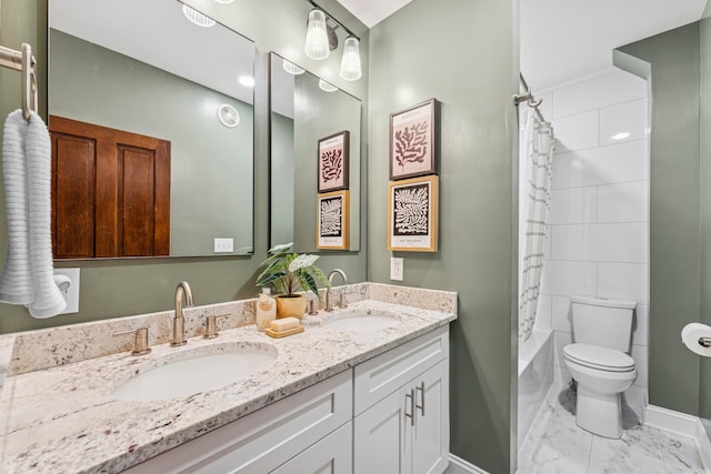 1057 Harrison Ave, Columbus, OH 43201 - full bathroom with marble finish flooring, double vanity, and shower / tub combo