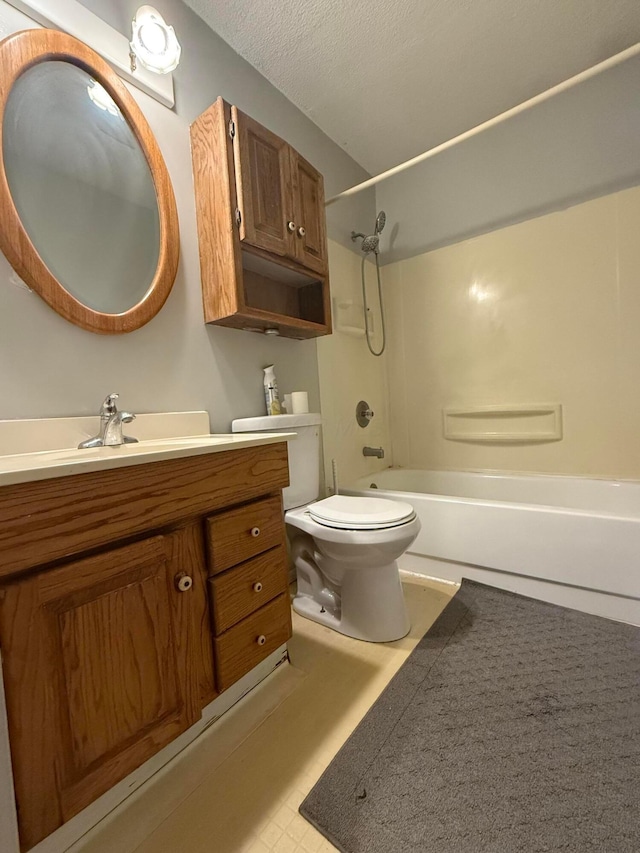 2836 Palisades Ave, Columbus, OH 43207 - bathroom featuring vanity, shower / bathtub combination, a textured ceiling, and tile patterned floors