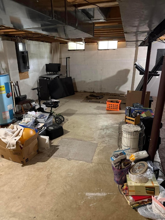 2836 Palisades Ave, Columbus, OH 43207 - basement with water heater, concrete block wall, and electric panel